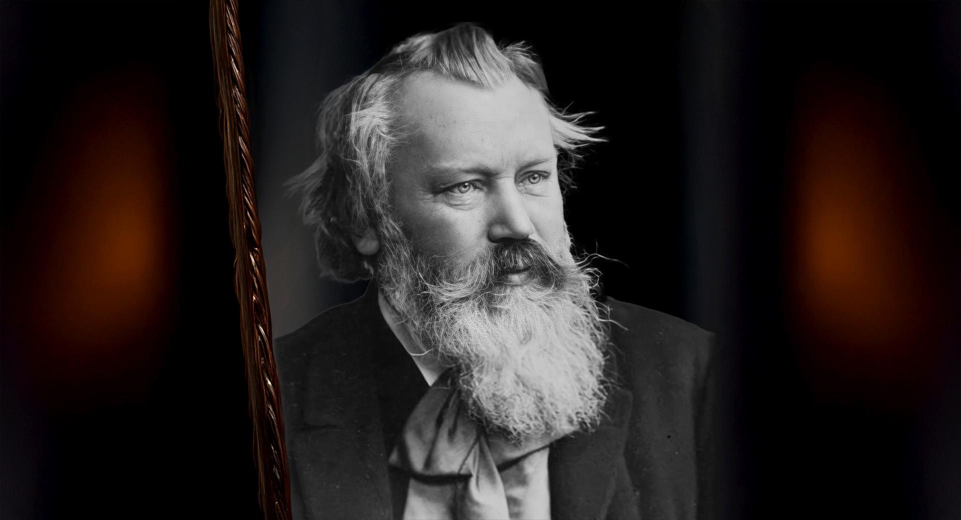 Ett utklippt svartvitt foto på Johannes Brahms på en mörkröd bakgrund.