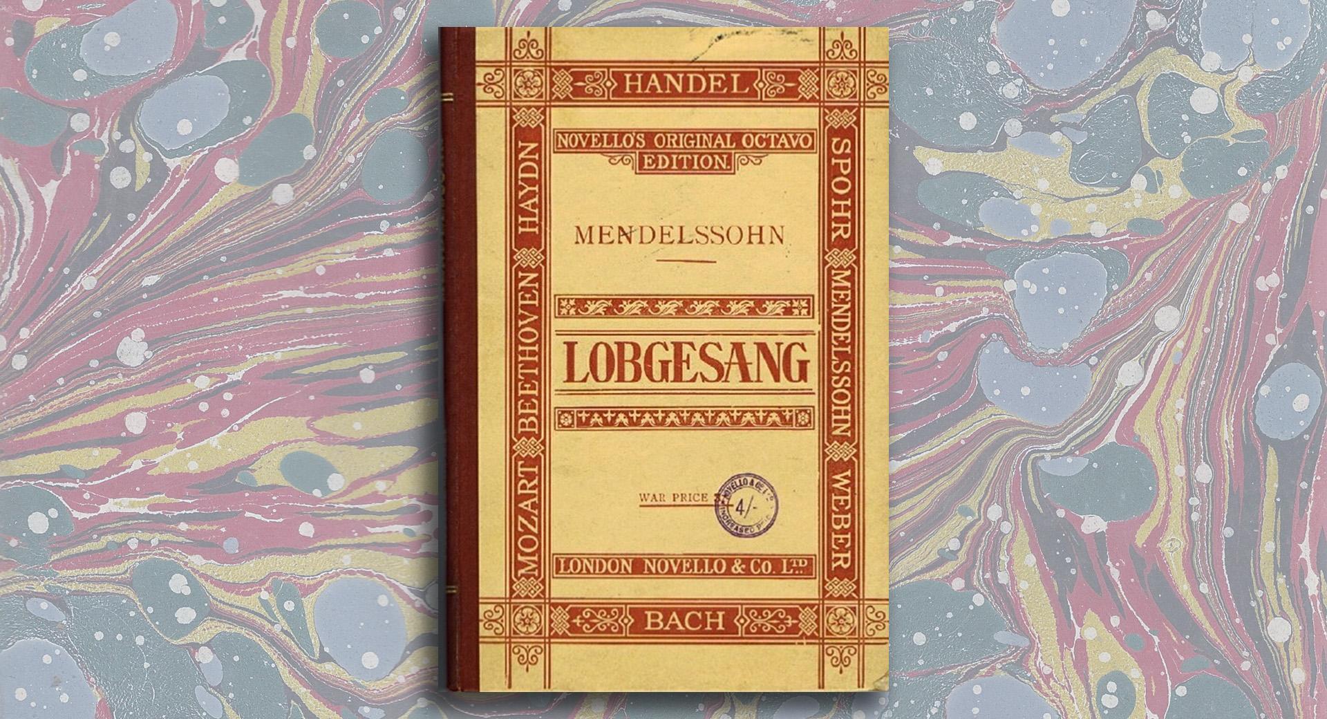 Partituret för Mendelssohns Lobgesang mot en färglad, spräcklig botten.